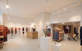 Elegant retail space showcasing contemporary fashion and interior design.